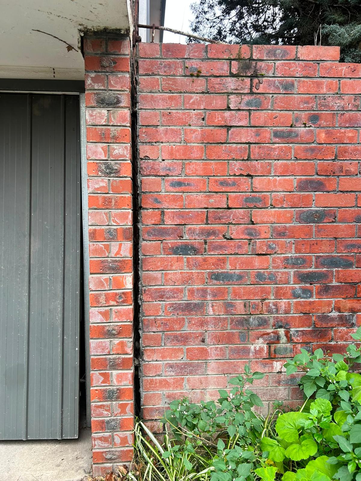 Vertical separation crack in an external brick wall